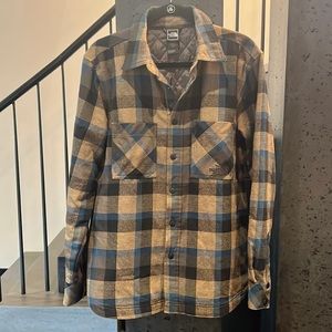 The North Face brown/black/blue flannel quilted lined snap jacket coat. Size S